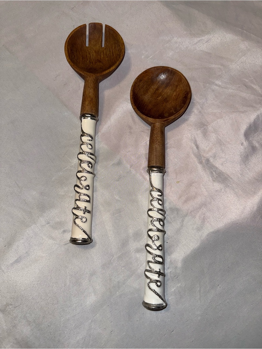 Wooden Salad Servers with Decorative White Handles and the word CELEBRATE.